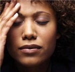 Young Woman Thinking --- Image by © Royalty-Free-Corbis